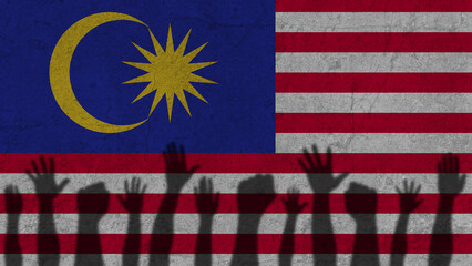 Protesters hands shadow on Malaysia flag, political news banner, against the decision concept