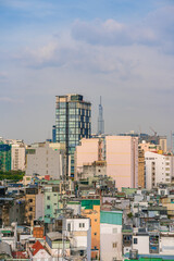 Fototapeta premium Ho Chi Minh City, Vietnam - December 20, 2022: Beautiful afternoon in District 1, Ho Chi Minh City, known as Saigon, a developed city of Vietnam with many skyscrapers. View to Bitexco, Landmark 81.