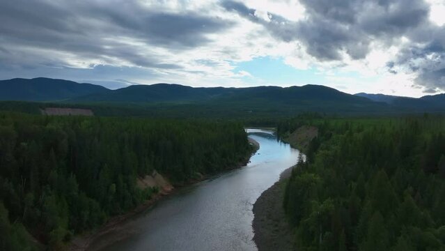 Dramatic Sunset Sky Over Flathead River In North Fork, Glacier National Park In Montana, USA. Aerial Shot