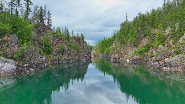 Mirror Reflections Through Flathead River Near Glacier National Park In Montana, United States. Aerial Shot
