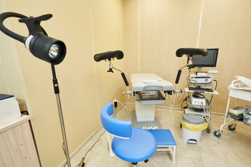 armchair in the medical office of the proctologist in the hospital. doctor's office for examining a patient in a hospital