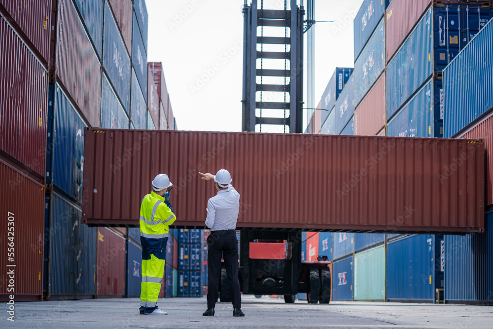 Poster businesspeople with cargo container worker check goods and stock in industrial container terminal,ex