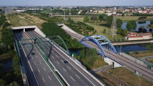 Aerial view of the highway and high speed rail, Bernate, near Milan, Italy