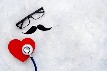 Black glasses with a mustache and stethoscope. Mans health concept