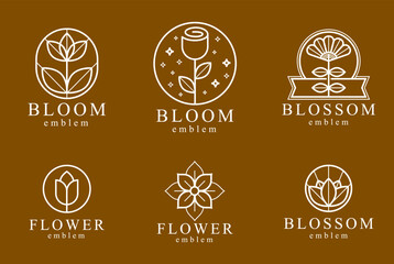 Geometric linear style vector flower logos or emblems set, sacred geometry floral symbols line drawing emblems collection, blossoming flower hotel or boutique or jewelry logotypes.