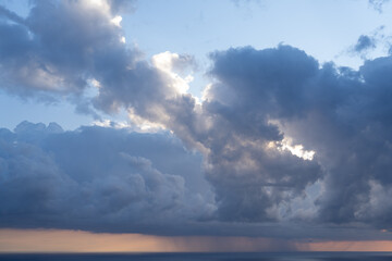 Fototapeta na wymiar Clouds over the sea