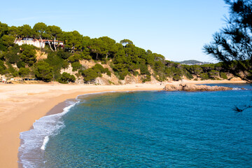 Deserted beach on a sunny winter day, Beach on the Catalan Costa Brava, Spain
