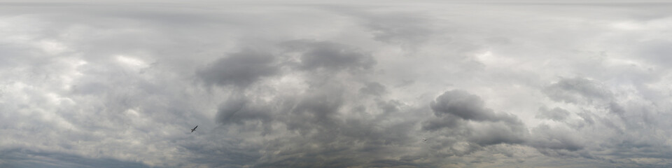 Overcast sky panorama on rainy day with Nimbostratus clouds in seamless spherical equirectangular format. Full zenith for use in 3D graphics, game and for aerial drone 360 degree panorama as sky dome.