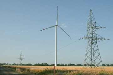 Windmill produces renewable energy. Ecofriendly wind turbine generates energy against power...