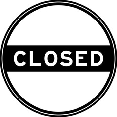 Black color round seal sticker in word closed on white background