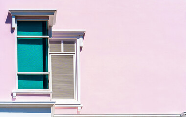 window with pink shutters, building wall exterior with blue windows outside on daylight well free space for text promotions 