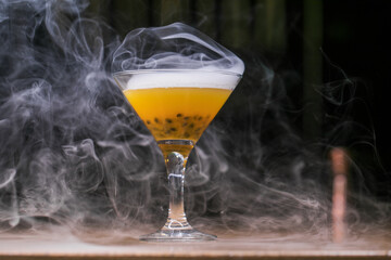 Alcoholic cocktail with passion fruit