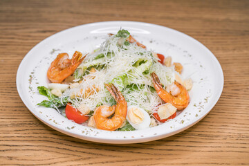 Restaurant dish - Caesar salad with shrimps