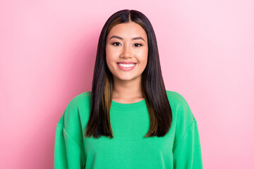 Fototapeta premium Photo portrait of young vietnamese model woman wear green trendy jumper toothy beaming smile enjoy look you isolated on pink color background