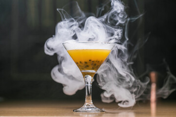 Alcoholic cocktail with passion fruit