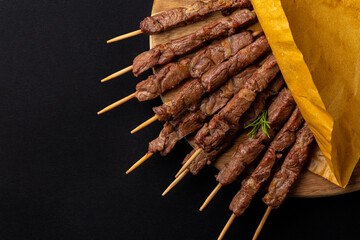 Lamb skewers or kebabs cooked on a brazier, with rosemary and spices.  Arrosticini, italian meat...