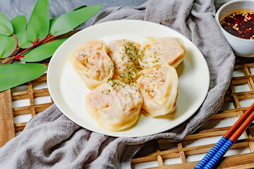 kimchimandu, Korean Kimchi dumpling : Kimchi dumplings are stuffed with a filling of chopped kimchi, bean curd, and vegetables. They are the most popular type of dumpling among Koreans.