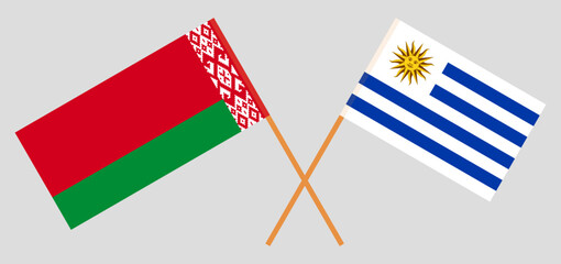 Crossed flags of Belarus and Uruguay. Official colors. Correct proportion