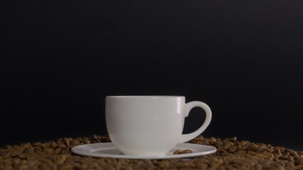 Coffee cup on black background
