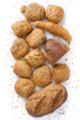 Bread assortment from various bakery products, white background, simple isolation