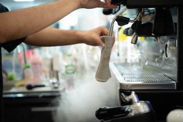 Coffee expert barista Making hot Americano for customers