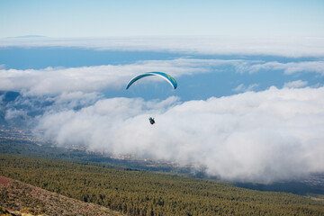 Paragliding in Tenerife from the volcano through the clouds.