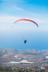 paraglider in the sky, nice view with the sea