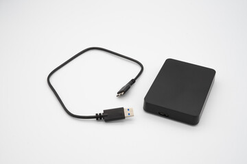 The black USB external hard disk for data transfer