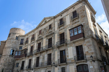 Fototapeta na wymiar A historic building on the Nova Square (Catalan: Plaça Nova), Barcelona