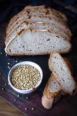 Loaf of wholemeal bread with buckwheat. Buckwheat bread slices