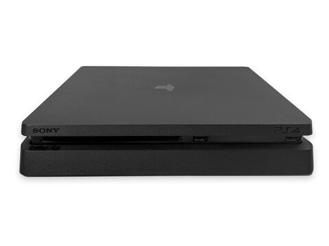 Sony PlayStation 4 PS4 Slim Games Console on white background. Front view.