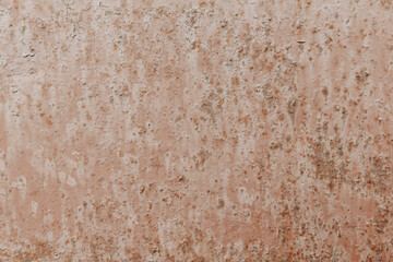 A tinny old painted wall with corrosion. Weathered surface with damages. Abstract detailed texture background.