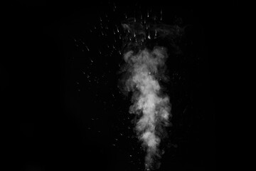 A white curly steam with a spray of drops rising up is isolated on a black background to overlay your photos