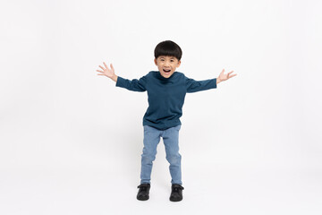 Happy Asian little boy open arms from happiness isolated on white background, Excited kid winner...