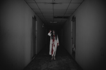 Portrait of asian woman make up ghost,Scary horror scene for background,Halloween festival...
