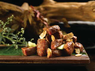 Sauteed Beef Cubes with Foie Gras Sauce Garlic served dish isolated on background top view food