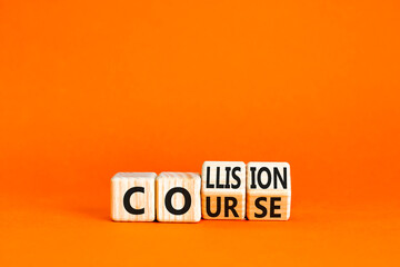 Collision course symbol. Concept word Collision course on wooden cubes. Beautiful orange table orange background. Business collision course concept. Copy space.