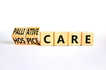 Palliative or hospice care symbol. Concept word Palliative care Hospice care on wooden cubes....