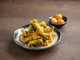 Deep-fried Fish Skin with Salted Egg Yolk served dish isolated on background top view food