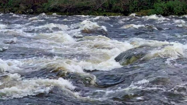 River Dee last flowing due to high water level during the winter