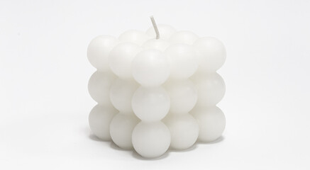 White candle square shape on a white background isolated.