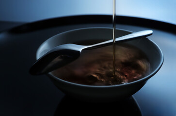 A cup of tea with spoon
