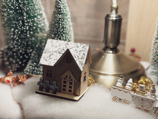 Little wooden house on christmas day and winter season