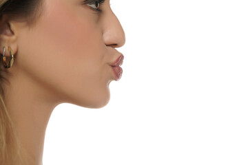 Close-up details of a woman's face. Nose, pursed lips, neck. Profile, side view