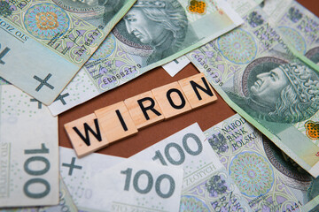 Inscription WIRON next to polish money. WIRON is Warsaw Interest Rate Overnight. Replacement of WIBOR by WIRON