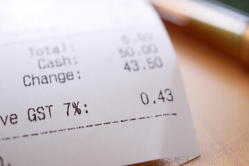 GST vat word in a receipt on table 