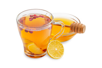 Hot natural organic antioxidant tea made with cranberries, lemon citrus slices and sweet healthy honey served in transparent glass cup with ingredients isolated on white background used in winter