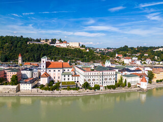 Fototapeta na wymiar Aerial view of the old town of Passau with St. Michael church and Niedernburg Monastery church, Passau, Germany