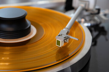 Vintage Stereo Turntable Vinyl Record Tonearm Cartridge Closeup. - 556529580