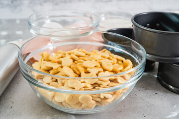 Crackers in a glass bowl close-up. Cheesecake recipe, preparation